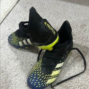 Adidas Black and Yellow Sneakers with Signature Stripes